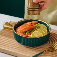 D_NQ_NP_2X_636867-MLM77016045359_062024-F-plato-de-ceramica-circular-con-mango-dorado-moderno